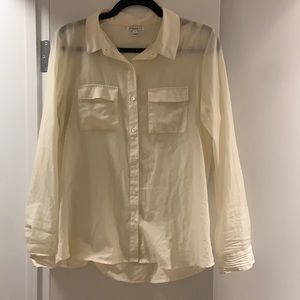 Sheer beige shirt from Olsen sister’s first brand